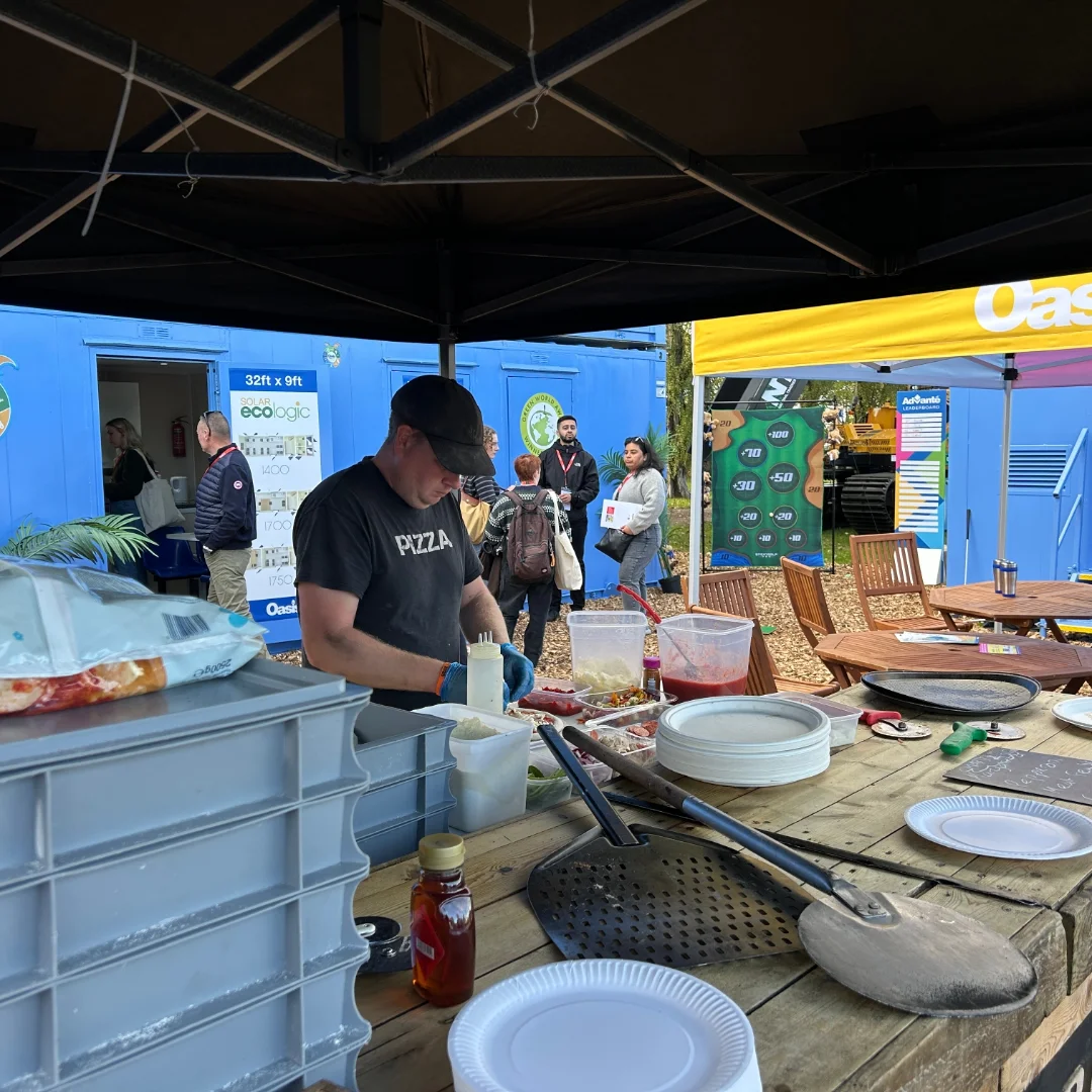 Wood fired Pizza Bar catering for Oasis Welfare at the Plant Worx Construction Show making pizzas